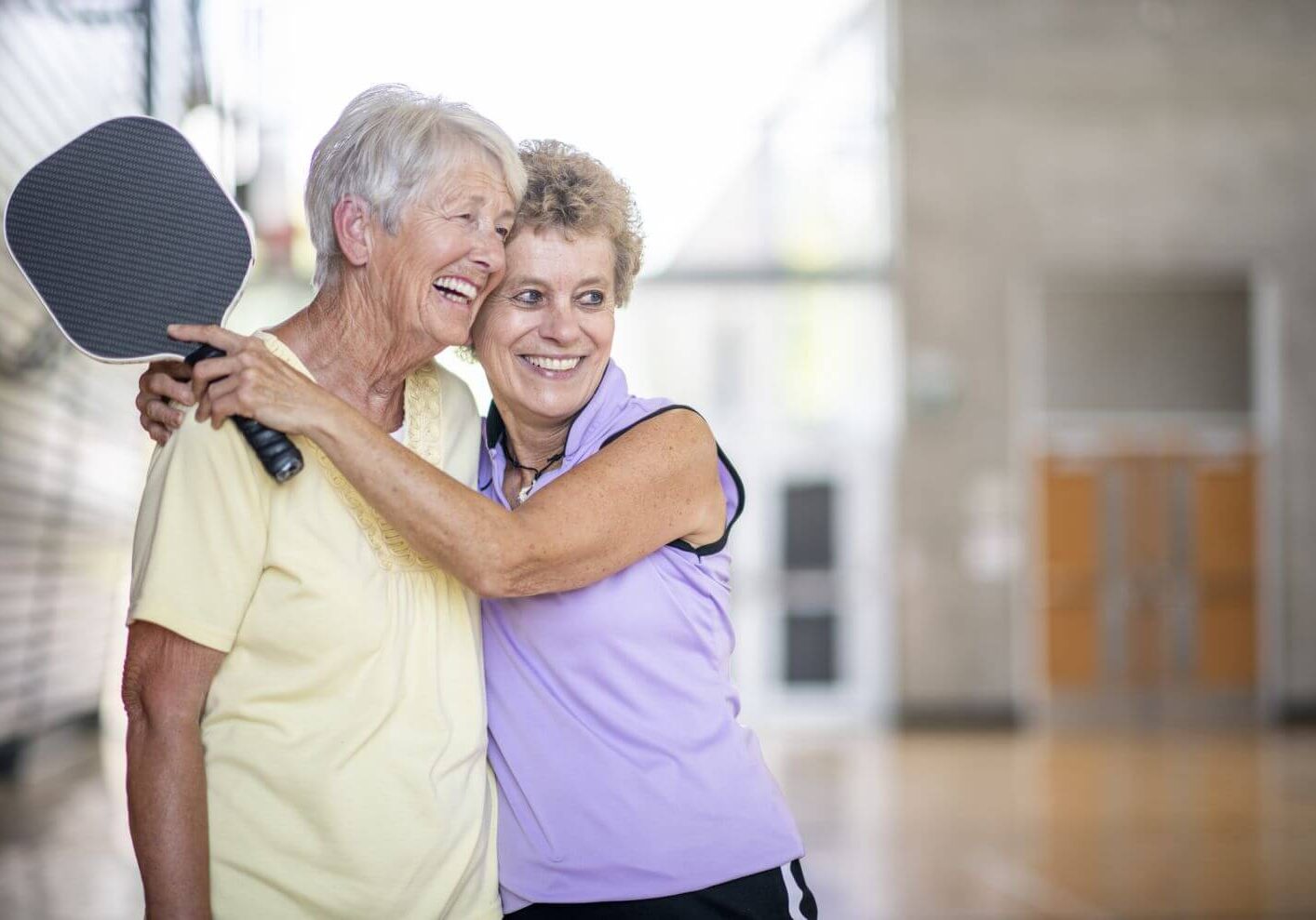 seniors leading a health lifestyle playing pickleball